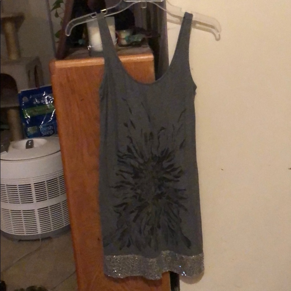 Gray sleeveless dress with sequins on bottom
